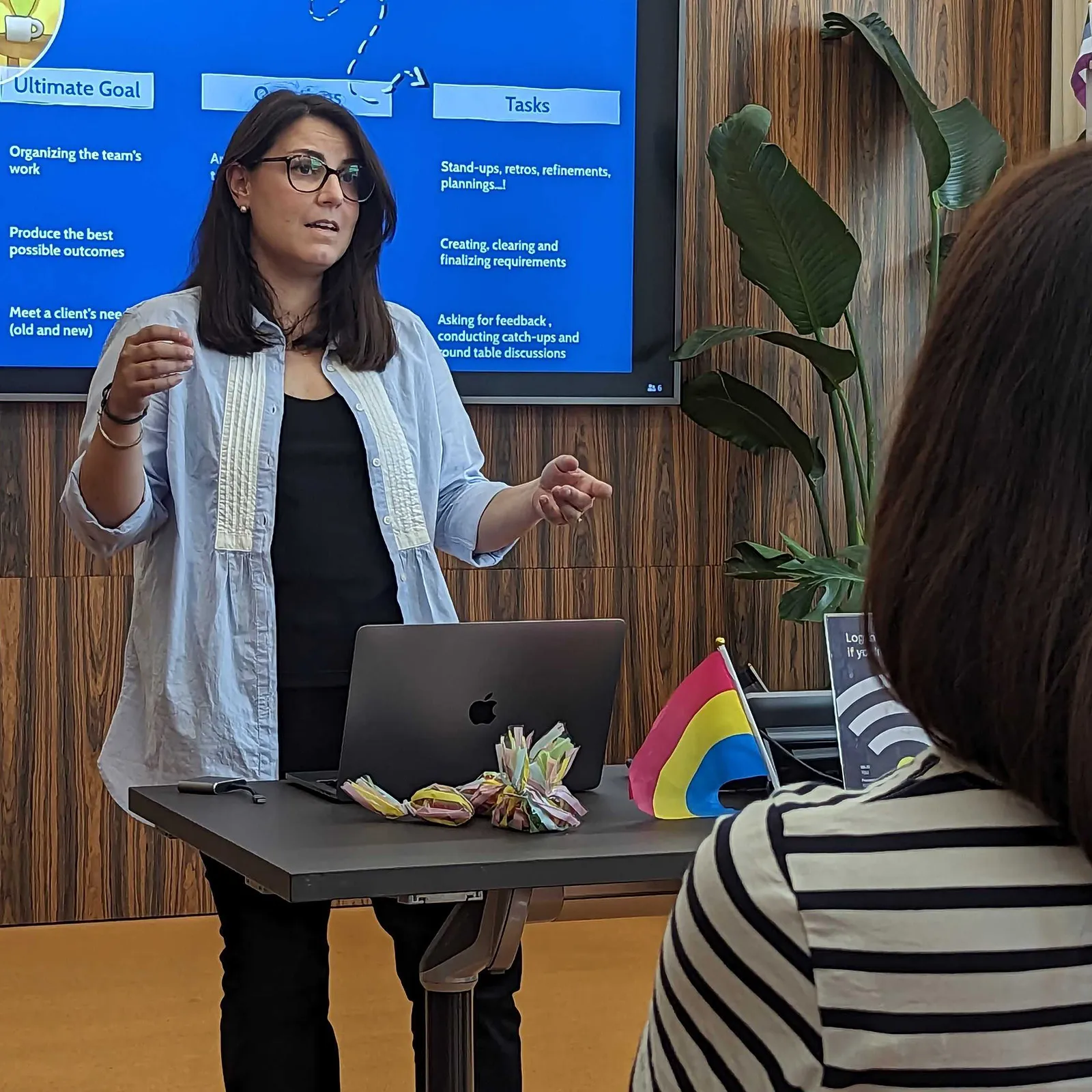 A woman giving a presentation
